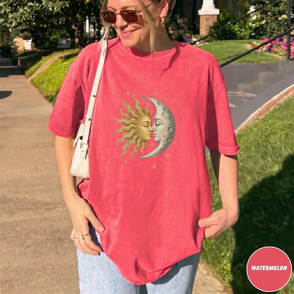 Watermelon-red tee with a sun-and-moon design