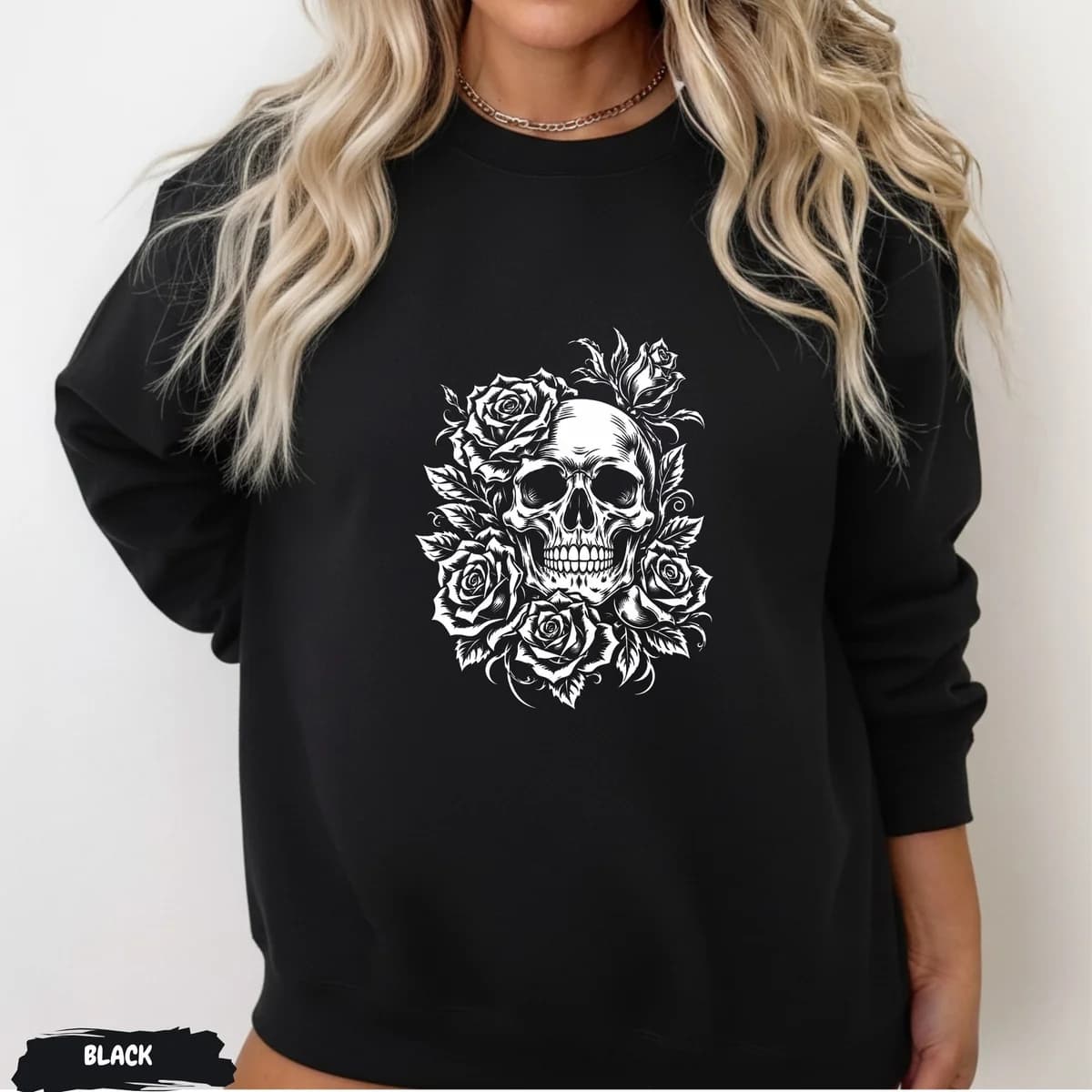 Black sweatshirt with a floral skull design