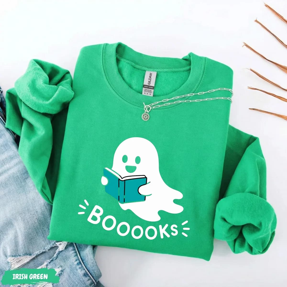 Green tee with a book-reading ghost design