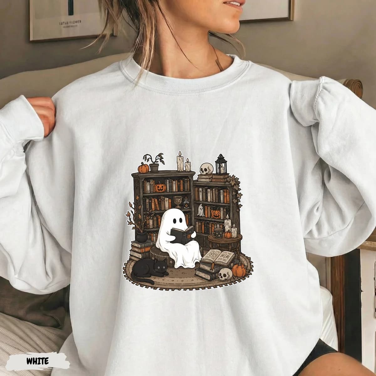 White sweatshirt with a ghost-in-a-library design